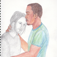 black man kissing another man's forehead