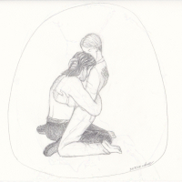 two men embracing while sitting