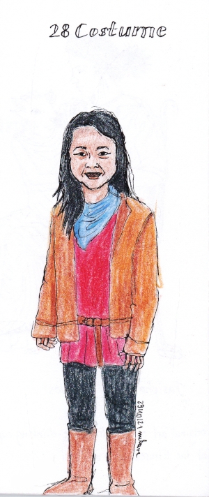 a little girl in a Merlin costume